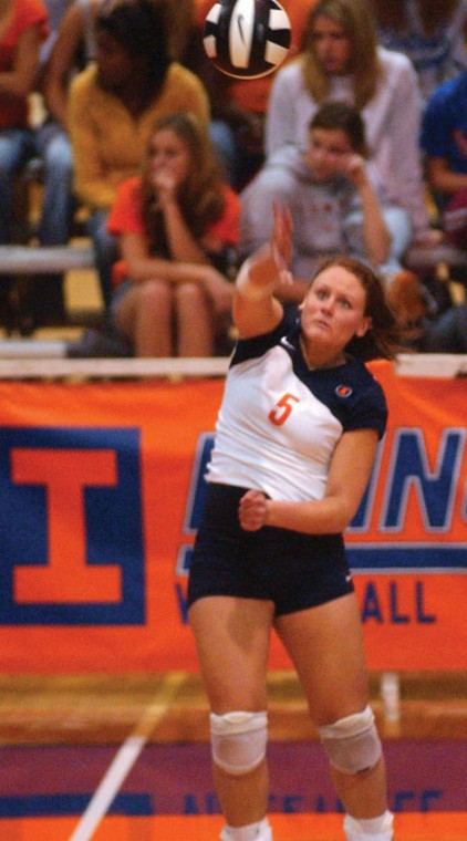 Illinois freshman Ashley Edinger serves a volley during a match against Iowa, Saturday, September 30. She is loved for the positive influence she has on teammates. Adam Babcock
