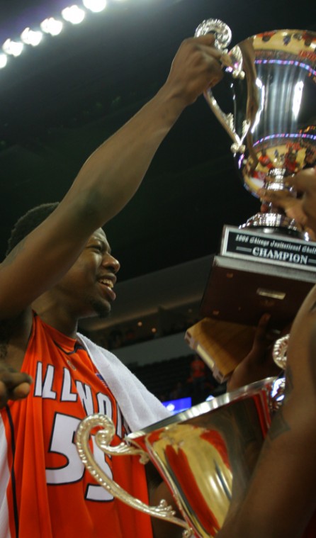Illinois forward Shaun Pruitt holds up the Chicago Invitational Challenge championship cup after the game against Bradley, Saturday, Nov. 25, 2006 at the Sears Center in Hoffman Estates, Ill. Pruitt was the second-leading scorer, contributing 16 points t Adam Babcock The Daily Illini
