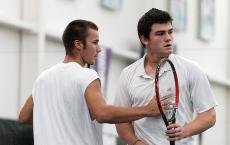 Billy Heiser and Sasha Kharkevitch look at their opponents, Bjorn Munroe and Chris Klingemann, during the USTA Challenge at Atkins Tennis Center, Sunday. Beck Diefenbach
