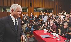 Defense Secretary-designate Robert Gates waits to answer questions prior to the start of his confirmation Tuesday. The Associated Press
