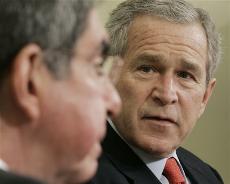 President Bush, right, looks toward Costa Rican President Oscar Arias Sanchez during their meeting in the Oval Office of the White House in Washington, Wednesday, Dec. 6, 2006. The Associated Press
