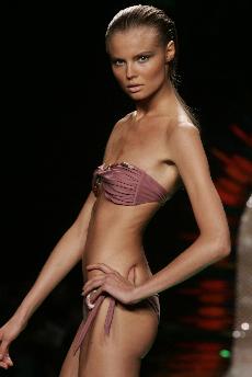A model walks the runway at the Rosa Cha spring 2007 fashion show on Sept. 10 in New York. The Council of Fashion Designers of America released a list of recommendations on Friday, three weeks before the fall fashion showcase in New York, as part of a new Diane Bondareff, The Associated Press
