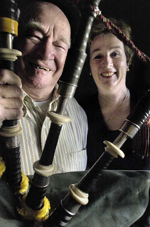 Dave and Kitty McKee are seen with a set of bagpipes at their Chicago (Ill.) home on Sept. 21, 2006. (AP Photo/The Daily Southtown, Matt Marton)
