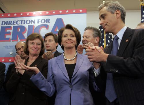 House Speaker Nancy Pelosi of Calif., center, accompanied by fellow Democratic House members, applaud during a news conference on Capitol Hill in Washington, Thursday, Jan. 18, 2007 to discuss the work of the 110th Congress during their first 100 hours. (AP Photo/Susan Walsh)
