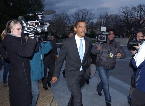 Sen. Barack Obama, D-Ill., arrives on Capitol Hill in Washington Tuesday, Jan., 16, 2007, to vote, after announcing earlier he intends to form a presidential exploratory committee. (AP Photo/Dennis Cook)
