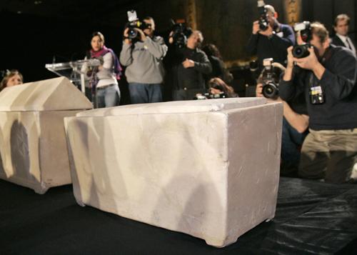 Two ossuraries found in a 2,000 year-old tomb in Jerusalem and that may have held the remains of Jesus of Nazareth, right, and Mary Magdalene, left, are displayed during a news conference in New York, Monday. The Associated Press
