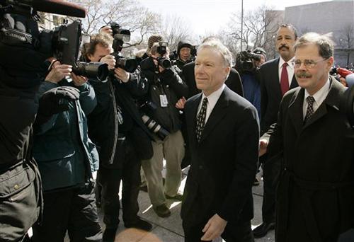 Former White House aide I. Lewis "Scooter" Libby, left, accompanied by his attorneys Theodore B. Wells, center, and William Jeffress, Jr. prepares to meet reporters outside federal court in Washington, Tuesday, March 6, 2007, , after the jury reached its The Associated Press
