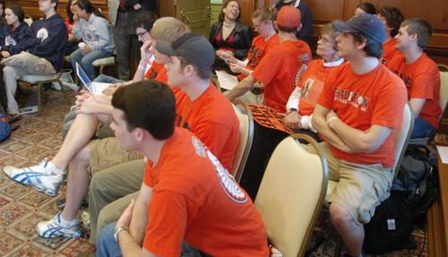 Students concerned about the future of Chief Illiniwek listen to the comments made during the Board of Trustees meeting at the Pine Lounge in the Illini Union Tuesday morning. ME Online
