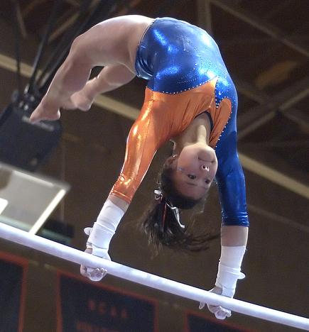 Nicole Cowart competes in the bars portion of a match against University of Illinois-Chicago, Saturday March 17, 2007 at Huff Hall. Cowart received a score of 9.225 on the bars, helping the Illini defeat UIC 195.625 to 193.975. Beck Diefenbach
