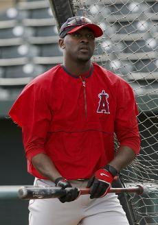 Los Angeles Angels outfielder Gary Matthews Jr. heads into the batting cage to take batting practice during spring training workouts at Tempe Diablo Stadium Wednesday in Tempe, Ariz. The Associated Press
