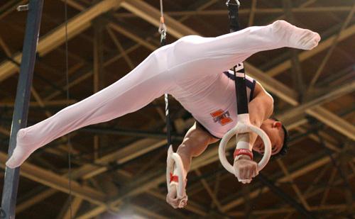 Illinois gymnast Tyler Yamauchi performs on the rings during the meet against Iowa at Huff Hall, Saturday, March 3, 2007. Yamauchi tied for first on the rings with a score of 9.6, took first on the parallel bars and second on the vault. ME Online
