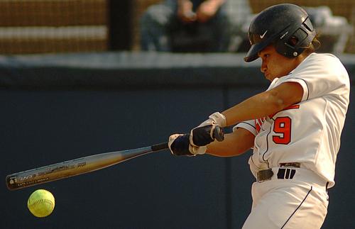 Illinois shortstop Angelena Mexicano, a junior, swings for the ball during the bottom of the first inning against University of Illinois at Chicago at Eichelberger Field on Wednesday. Illinois beat UIC 18-4. Jenette Sturges
