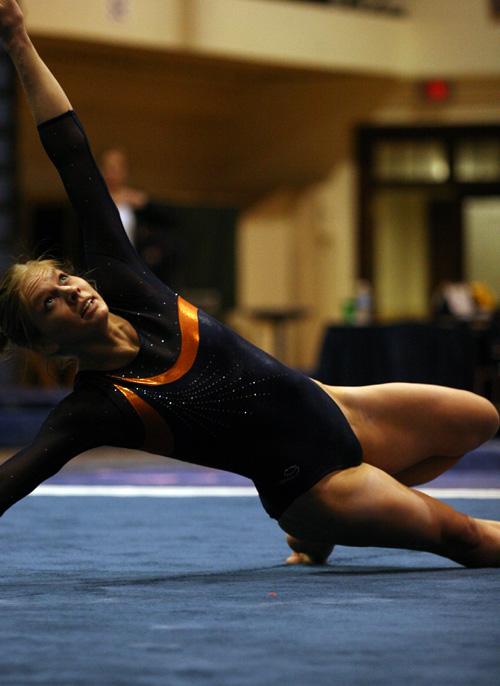 Cara Pomeroy performs her floor routine during the meet at Huff Hall on Feb. 25, 2007. ME Online

