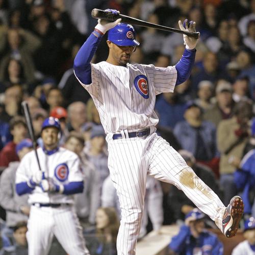 Chicago Cubs first baseman Derrek Lee reacts after striking out with two runners on base during the seventh inning against the Milwaukee Brewers Monday night in Chicago. The Cubs fell to the Brewers for the second consecutive time, 5-4. M. Spencer Green, AP
