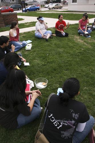 Student leaders on campus have a discussion about Native American Culture outside between the Native American House and the Asian American Cultural Center during the Multicultural Conference on Saturday, Mar. 31, 2007 at the four cultural houses. Beck Diefenbach
