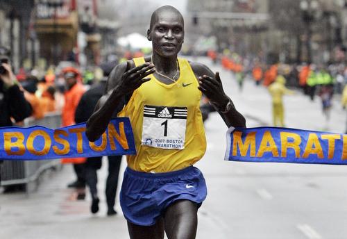 Robert Cheruiyot of Kenya crosses the finish line in Boston Monday, as he wins the 111th running of the Boston Marathon. Elise Amendola, AP
