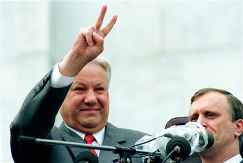 Russian President Boris Yeltsin makes a V-sign at the start of the rally attended by tens of thousands of people to celebrate the failed military coup in Moscow in this Aug. 22, 1991 file photo. Former President Boris Yeltsin, who engineered the final col The Associated Press
