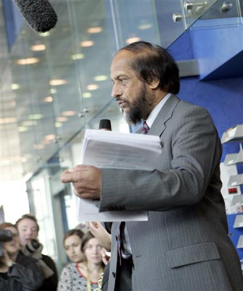 Chairman of the Intergovernmental Panel on Climate Change Rajendra Pachauri gives a short press conference in the lobby of the EU Charlemagne building in Brussels, Friday April 6, 2007. An international global warming conference approved a report on clima Bridget Maiellaro
