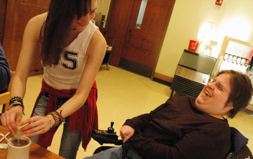Sarah Chambers, junior in Education, prepares coffee and chats with resident Carmen Sutherland, senior in AHS, at Beckwith Hall, 201 E. John St., Champaign, on March 5. Beckwith Hall, a residence for University students with disabilities, celebrates its 2 Beck Diefenbach
