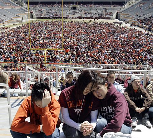 Thousands of students monitor a convocation at Worsham Stadium on the campus of Virginia Tech University in Blacksburg, Va., Tuesday. Amy Sancetta, AP
