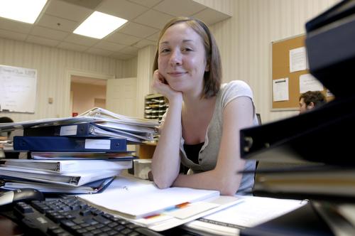 Katie Dunne, sophomore in LAS and vice president internal of the Illinois Student Senate, poses at her desk in the Union on Monday. Beck Diefenbach
