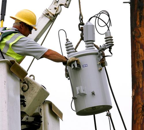 Ameren utility worker Dick Wood installs an electric power transformer near Springfield, Ill., Friday, May 25, 2007. This legislative session Illinois lawmakers could end up making decisions that will affect electricity bills for years. The Associated Press
