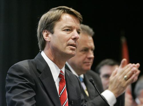 Democratic presidential hopeful, former North Carolina Sen. John Edwards, left, is applauded by members of the International Association of Machinists and Aerospace Workers, Wednesday in Washington. At right is Rich Michalski, general vice president of th The Associated Press
