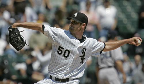 Chicago White Sox pitcher John Danks throws during the first inning of a baseball game against the New York Yankees Wednesday in Chicago. The White Sox defeated the Yankees 5-3. The Associated Press
