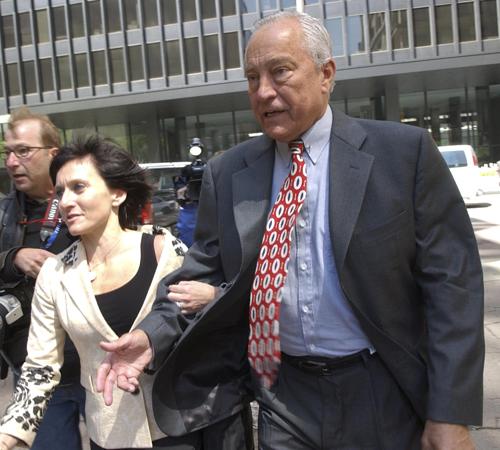 Former Chicago alderman Edward Vrdolyak, right, walks with attorney Jacqueline Jacobson as he exits the Federal Courthouse, Thursday in Chicago, after pleading not guilty to scheming to get a $1.5 million kickback in a real estate deal. The Associated Press
