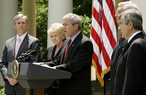 President Bush, center, speaks about CAFE (Corporate Average Fuel Economy) standards and alternative fuel standards in the Rose Garden of the White House in Washington, Monday, May 14, 2007. From left are, Deputy Energy Secretary Clay Sell; Transportation The Associated Press
