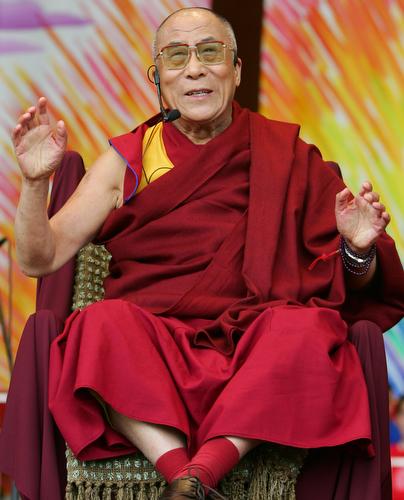 The Dalai Lama, the spiritual mentor to millions of Buddhists, addresses a crowd of about 11,400 at Millennium Park on Sunday, in Chicago. The Dalai Lama made his first public appearance in Chicago since 1999. Jerry Lai, AP
