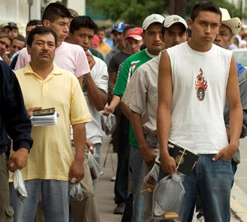 Mexicans line up outside de U.S. Consulate in Monterrey, Mexico, as they wait for a working visa interview, Thursday. Key senators in both the Democrat and the Republican parties, together with the White House, announced an agreement Thursday on an immigr The Associated Press
