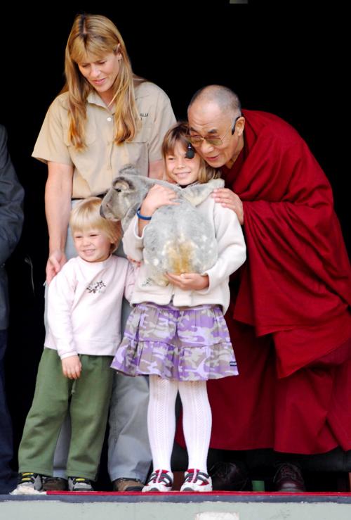 The Dalai Lama, right, poses with the Irwin family, Bindi, center holding Koala, Bob, lower left, and mother Terry, left, at Australia Zoo in Beerwah, Australia, Wednesday June 13, 2007. Steve Holland, Associated Press
