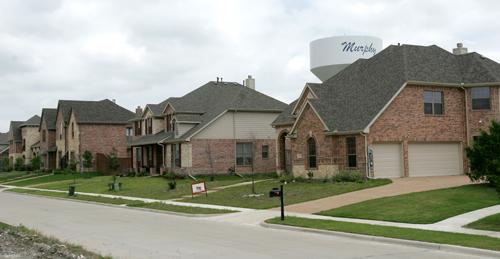 The house used in a sting operation in Murphy, Texas, is shown in the neighborhood at right in a June 19, 2007 photo. The house on High Point Drive was used in a nationally televised show to ensnare would-be pedophiles. After months of questions about evi Phil Collins
