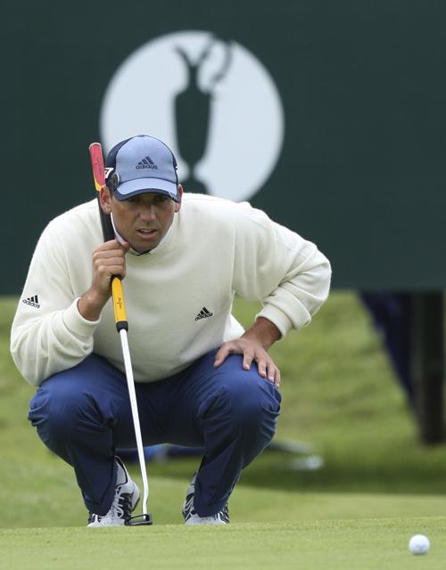 Sergio Garcia lines up a putt on the 13th green, during the British Open at Carnoustie, Scotland, on Thursday. Garcia turned in a 6-under 65 first round and holds a two-stroke lead going into Friday. Jon Super, The Associated Press
