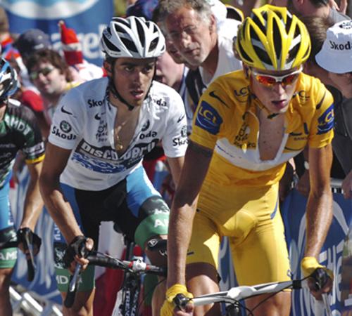 Overall leader Michael Rasmussen of Denmark, right, is followed by Alberto Contador of Spain and Levi Leipheimer of the U.S., left, as they climb the Aubisque pass during the 16th stage of the Tour de France cycling race between Orthez and Aubisque pass, Bernard Papon, The Associated Press
