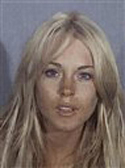 Lindsay+Lohan%2C+seen+here+in+a+booking+mug+released+by+the+Santa+Monica+police+department+on+Tuesday%2C+was+arrested+on+suspicion+of+drunken+driving+early+Tuesday%2C+authorities+said.+Santa+Monica+Police+Department%0A