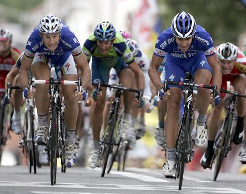 Gert Steegmans of Belgium, right, and his compatriot Tom Boonen, left, sprint towards the finish line of the second stage of the 94th Tour de France cycling race between Dunkirk, France, and Ghent, Belgium, on Monday. Steegmans won the stage and Boonen p Alessandro Trovati, The Associated Press
