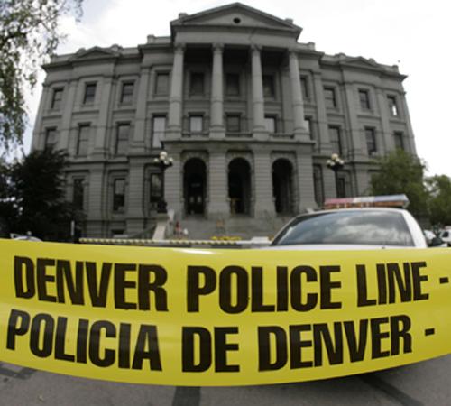 Police tape block the path to the Capitol in Denver on Monday, July 16, 2007, after suspect was shot when he apparently made threats against Gov. Bill Ritter. David Zalubowski, The Associated Press
