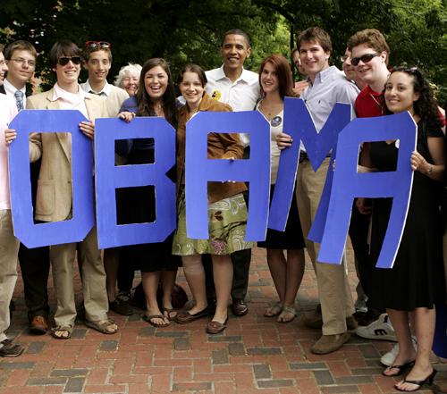 Democratic presidential hopeful Sen Barack Obama of Illinois poses with supporters during a campaign stop in Laconia, N.H., Monday, July 2, 2007. Jim Cole, The Associated Press
