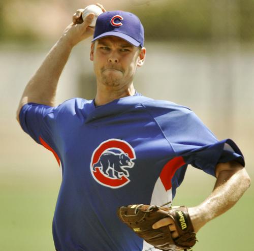 Chicago Cubs pitcher Kerry Wood delivers one of seven pitches during an Arizona Rookie League game against the Royals Thursday, July 19, 2007 at Fitch Park in Mesa, Ariz. Wood threw one inning in his comeback rehabilitation. Matt York, The Associated Press
