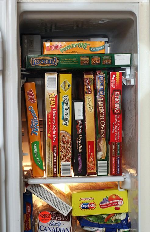 Frozen pizzas sit in a freezer in this Aug. 9 photo. The typical Midwesterner ate frozen pizza 22 times last year, nearly double the national average. THE ASSOCIATED PRESS, LARRY CROWE
