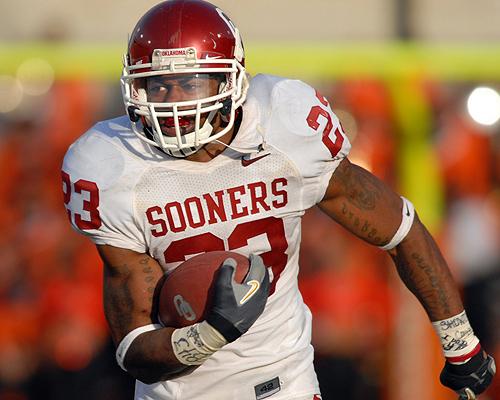 Oklahoma running back Allen Patrick (23) runs in Stillwater, Okla., on Nov. 25, 2006. Patrick is one of many Sooners who may play more now. THE ASSOCIATED PRESS, BRODY SCHMIDT
