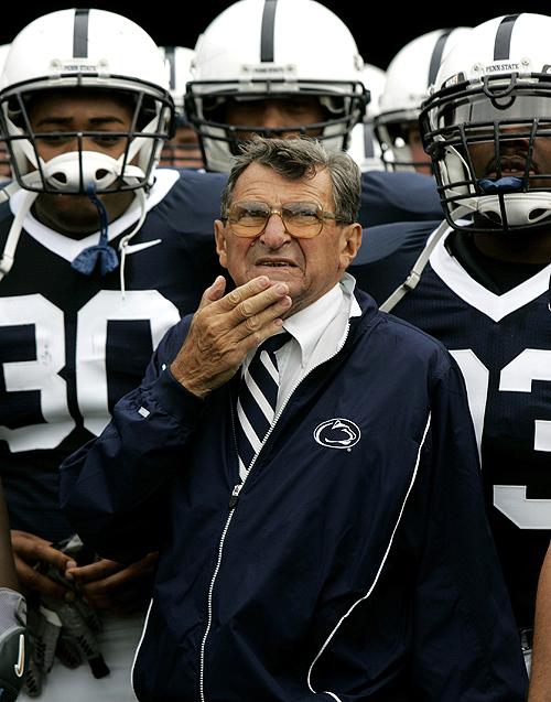 Penn State head coach Joe Paterno stands with his players before they run onto the field prior to their game against Youngstown State on Sept. 16, 2006 in State College, Pa., home of the Nittany Lions. THE ASSOCIATED PRESS, CAROLYN KASTER
