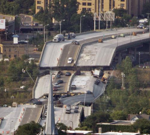 This is an aerial view of the Interstate 35W bridge over the Mississippi River seen Thursday, Aug. 2, 2007, in Minneapolis, after it collapsed during the evening rush hour Wednesday. Morry Gash, The Associated Press
