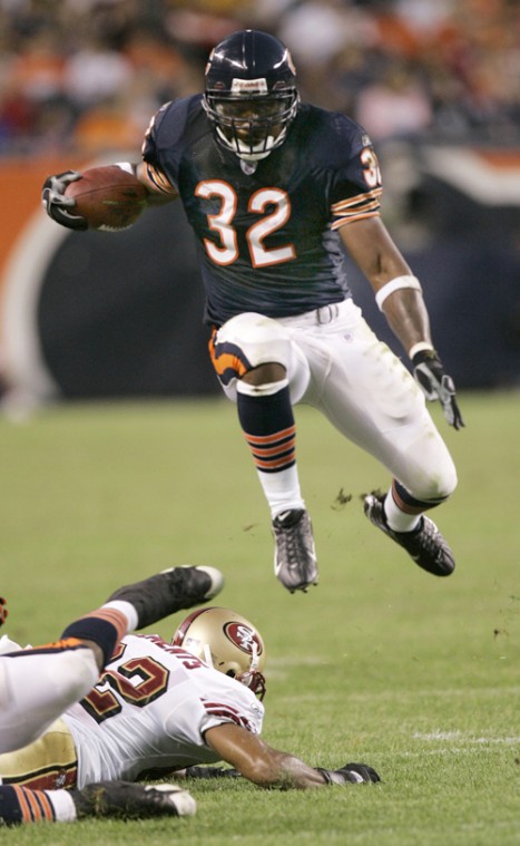 Chicago Bears' receiver Bernard Berrian, right, runs for a 37-yard