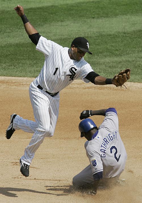 Royals left fielder Joey Gathright (2) steals second base under White Sox second baseman Danny Richar during the fourth inning in Chicago on Wednesday. Kansas City won 7-6 to put an end to a three-game skid. THE ASSOCIATED PRESS, CHARLES REX ARBOGAST
