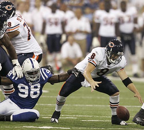 Indianapolis Colts defensive end Robert Mathis (98) holds back Chicago Bears quarterback Rex Grossman after he stripped the ball loose in the first quarter in Indianapolis on Monday. Smith called the fumble unacceptable. THE ASSOCIATED PRESS, DARRON CUMMINGS
