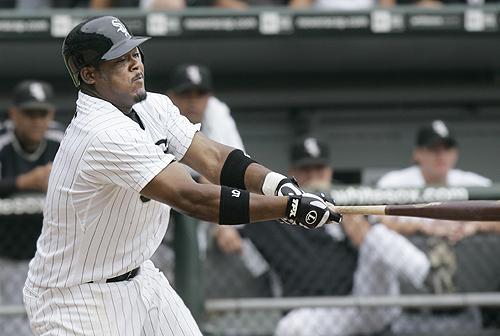 Juan Uribe swings through his solo home run, the third of three consecutive homers by the White Sox in the seventh inning of their 5-4 victory against Tampa Bay in Chicago on Monday. THE ASSOCIATED PRESS, CHARLES REX ARBOGAST

