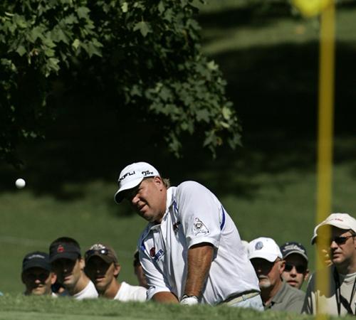 John Daly chips onto the 13th green during the first round of the 89th PGA Golf Championship at the Southern Hills Country Club in Tulsa, Okla., Thursday, Aug. 9, 2007. Morry Gash, The Associated Press
